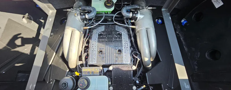 Slide: The Image of 2025 Malibu 25LSV engine compartment with supercharged engine components and cooling systems. - 8