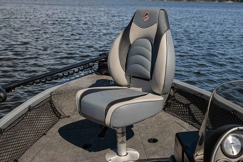Slide: The Image of 2024 Alumacraft Classic 165 Tiller boat seat on calm water. - 22