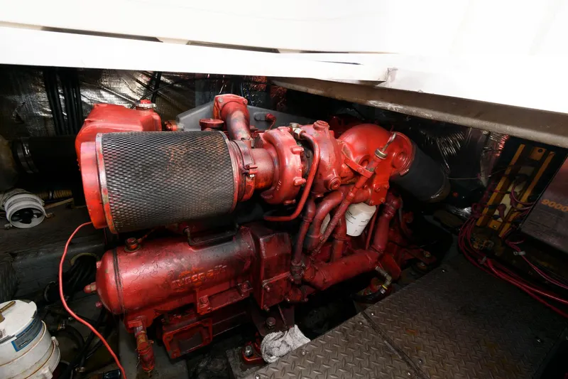 Slide: The Image of Red engine of 1992 Regal Commodore 402 boat in engine compartment. - 20