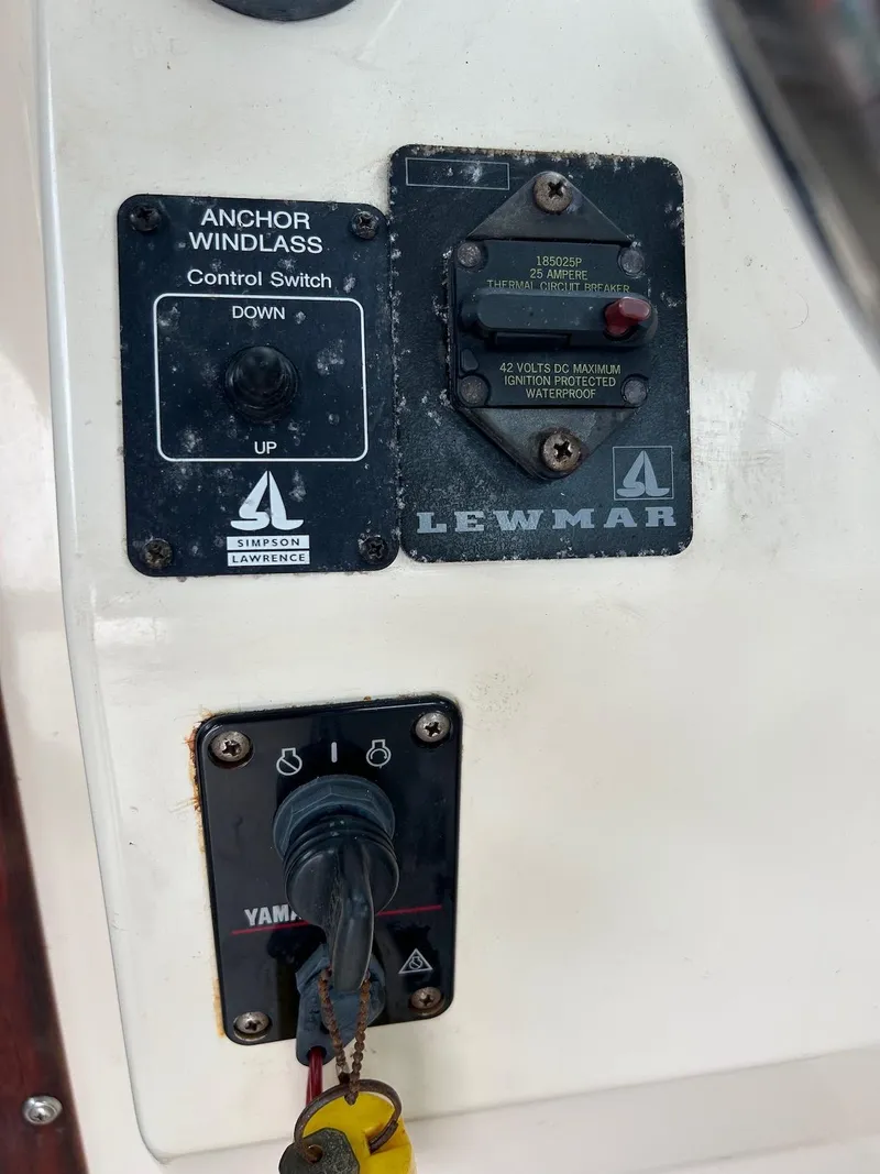 Slide: The Image of Control panel of 2001 Parker 2520 Modified Vee Sport Cabin boat with Lewmar anchor windlass switch. - 14