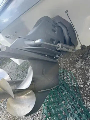 Slide: The Image of Close-up of 2000 Four Winns Sundowner boat propeller and outdrive. - 5