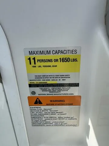 Slide: The Image of Capacity label on 2000 Four Winns Sundowner: 11 persons or 1650 lbs. - 8