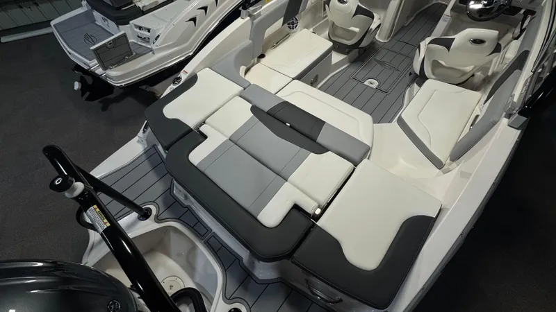 Slide: The Image of 2024 Chaparral 23 SSi OB boat interior with spacious seating and modern design. - 2
