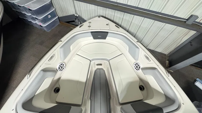 Slide: The Image of 2024 Chaparral 23 SSi OB boat interior, featuring spacious seating and modern design. - 24