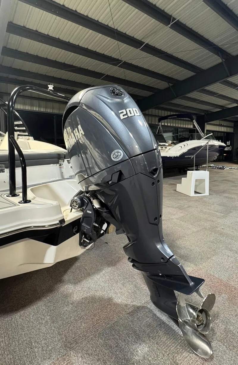 Slide: The Image of 2024 Chaparral 23 SSi OB with Yamaha 200 outboard engine in showroom. - 30