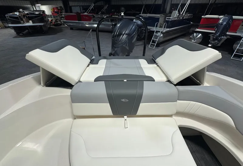Slide: The Image of 2024 Chaparral 23 SSi OB boat interior with adjustable seating and modern design. - 5