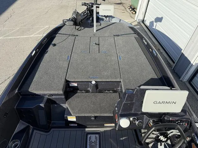 Slide: The Image of 2024 Bass Cat Puma STS boat storage compartments, open and spacious. - 11