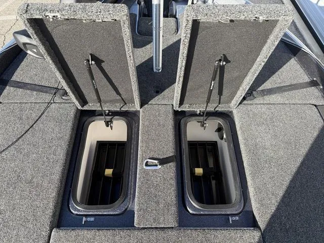 Slide: The Image of 2024 Bass Cat Puma STS interior with dual seats and sleek design. - 13