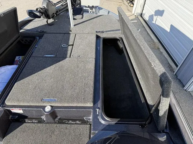 Slide: The Image of 2024 Bass Cat Puma STS boat interior with sleek dashboard and comfortable seating. - 15