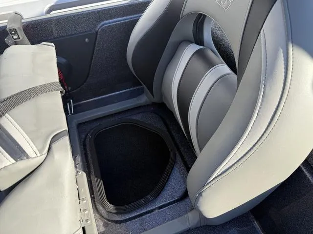 Slide: The Image of 2024 Bass Cat Puma STS interior seating and storage compartment. - 31