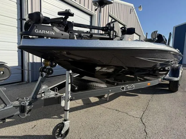 Slide: The Image of 2024 Bass Cat Puma STS boat with Garmin equipment on trailer. - 6