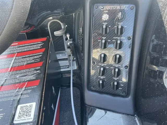 Slide: The Image of 2024 Phoenix 920 Elite control panel with switches and wiring. - 10