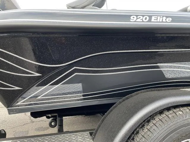 Slide: The Image of 2024 Phoenix 920 Elite boat with sleek black and silver detailing. - 3