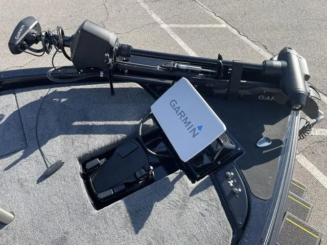 Slide: The Image of Garmin equipment on 2024 Phoenix 920 Elite boat deck, featuring advanced navigation technology. - 6