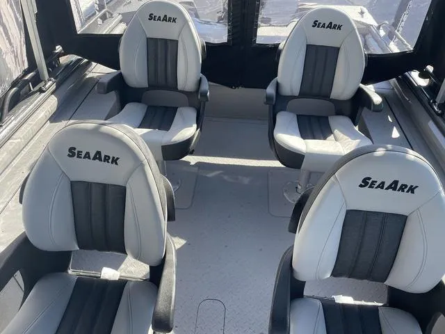Slide: The Image of 2025 SeaArk Pro Cat 240 interior with four cushioned seats. - 10