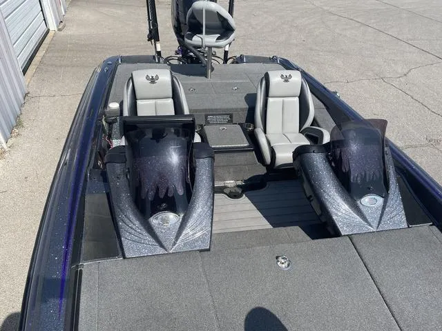 Slide: The Image of 2022 Phoenix 919 Pro XP boat interior with dual seats and sleek design. - 14