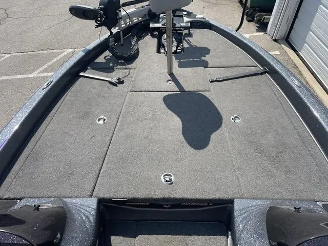 Slide: The Image of 2022 Phoenix 919 Pro XP boat deck with fishing seat and trolling motor. - 17