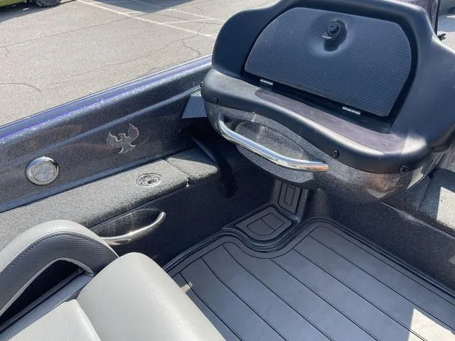 Slide: The Image of 2022 Phoenix 919 Pro XP boat interior with sleek seating and modern dashboard design. - 20