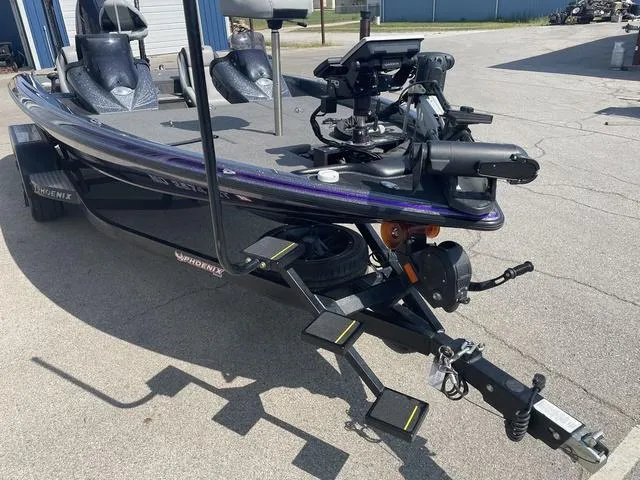 Slide: The Image of 2022 Phoenix 919 Pro XP fishing boat on trailer, parked outdoors. - 5