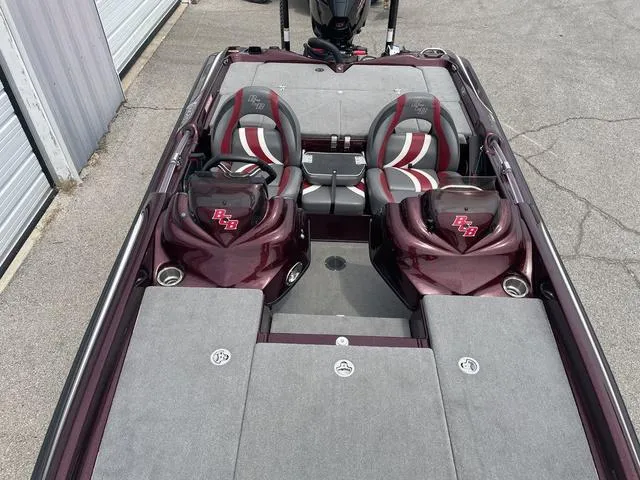 Slide: The Image of 2020 Bass Cat Cougar FTD boat interior with dual seats and storage compartments. - 14