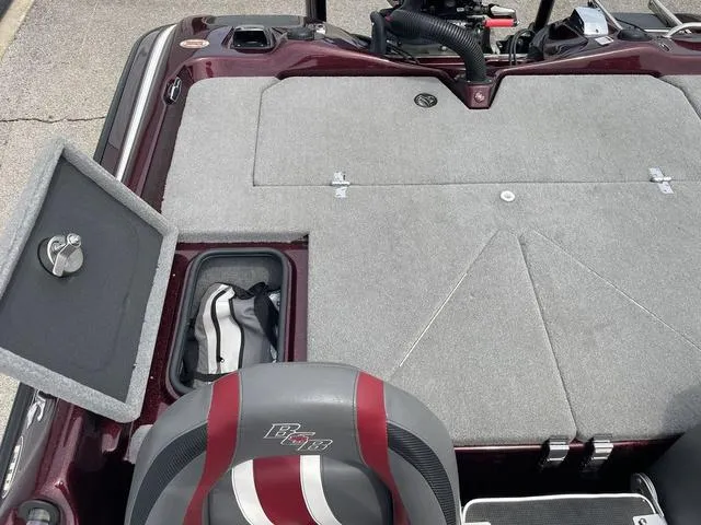 Slide: The Image of 2020 Bass Cat Cougar FTD boat interior with storage compartments and seating. - 22