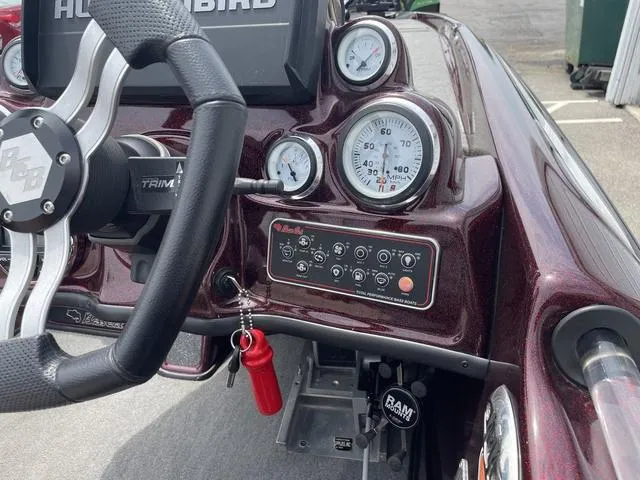 Slide: The Image of 2020 Bass Cat Cougar FTD dashboard with steering wheel and gauges. - 30