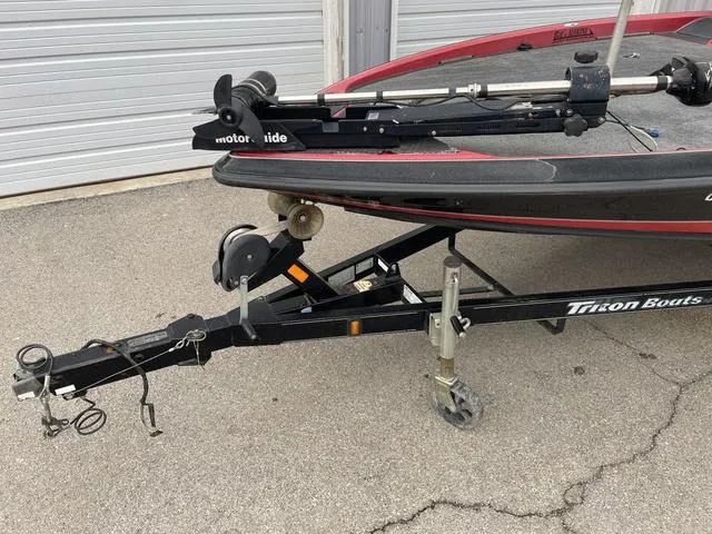 Slide: The Image of 2007 Triton 21 X2 boat on trailer with Motorguide trolling motor. - 5