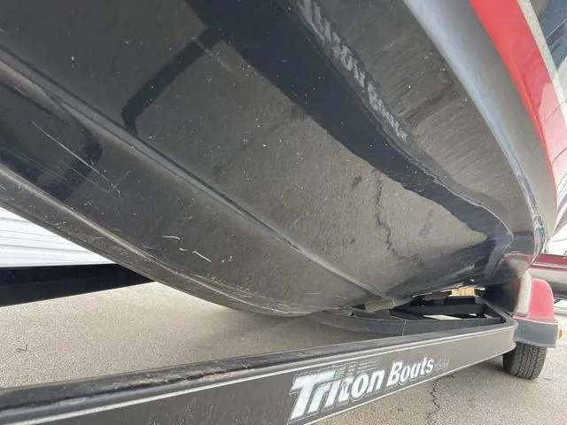 Slide: The Image of Close-up of a 2007 Triton 21 X2 boat hull on a trailer. - 6