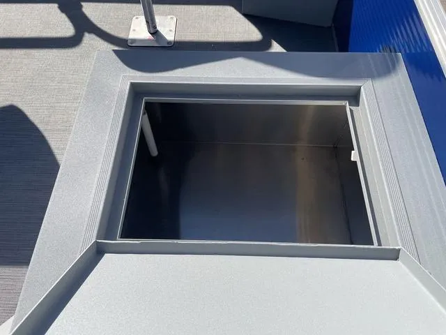 Slide: The Image of Open storage compartment on 2023 Lowe Ultra 182 Fish & Cruise boat. - 15