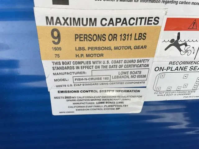 Slide: The Image of Capacity label for 2023 Lowe Ultra 182 Fish & Cruise boat, 9 persons or 1311 lbs. - 19