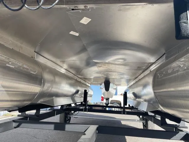 Slide: The Image of Underside view of 2023 Lowe Ultra 182 Fish & Cruise pontoon boat on trailer. - 6