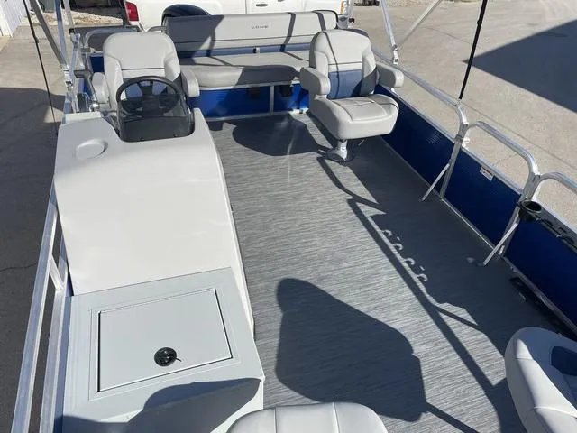 Slide: The Image of 2023 Lowe Ultra 182 Fish & Cruise boat interior with seating and steering console. - 8