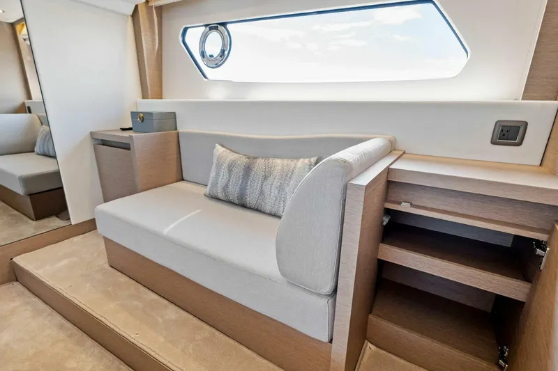 Slide: The Image of Luxurious interior of 2023 Prestige 460 Flybridge yacht with elegant seating and modern design. - 28