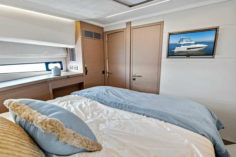 Slide: The Image of Luxurious bedroom interior of 2023 Prestige 460 Flybridge yacht with modern decor. - 34