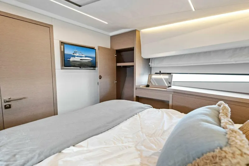 Slide: The Image of Luxurious bedroom interior of 2023 Prestige 460 Flybridge yacht with modern decor. - 36
