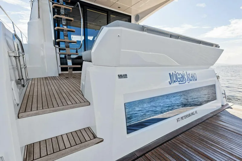 Slide: The Image of Prestige 460 Flybridge 2023 yacht with wooden deck and sleek design. - 47