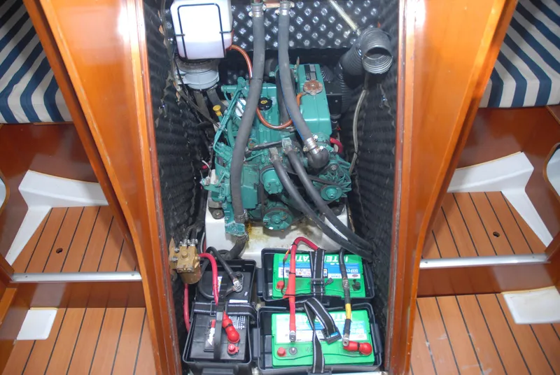 Slide: The Image of Engine compartment of 2003 Beneteau 36.7 sailboat with batteries and wiring. - 21