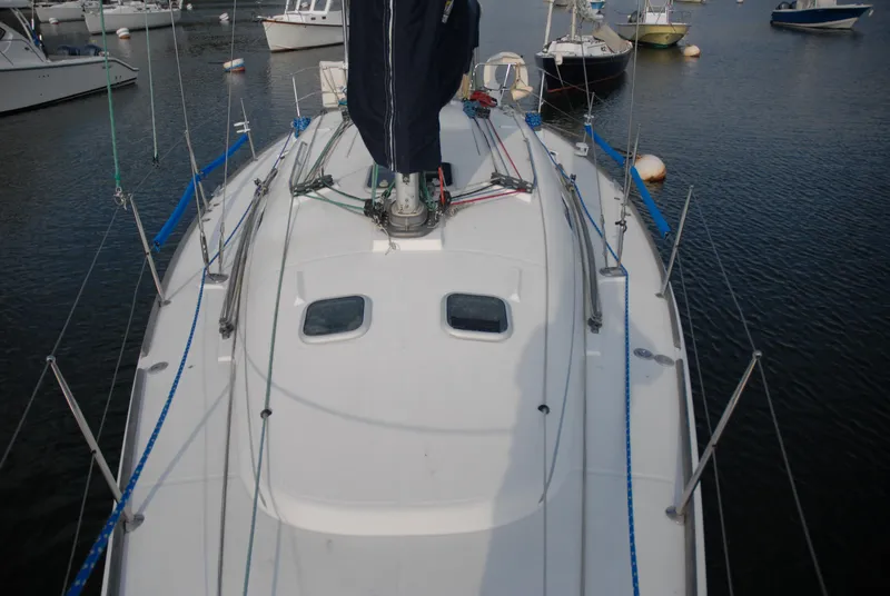 Slide: The Image of 2003 Beneteau 36.7 sailboat deck view in marina. - 9