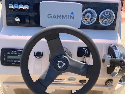 Slide: The Image of Steering console of 2019 Tahoe Pontoon GT 2385 with Garmin navigation system. - 9