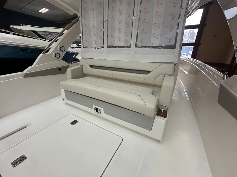 Slide: The Image of 2025 Tiara Yachts 34 LS interior with luxurious seating and modern design. - 6