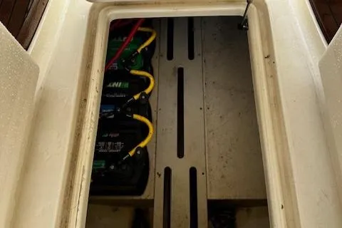 Slide: The Image of 2015 Scout 275 Dorado battery compartment with multiple batteries visible. - 19