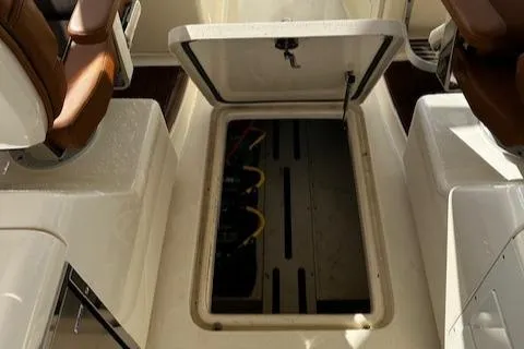 Slide: The Image of Open hatch on 2015 Scout 275 Dorado boat interior. - 20