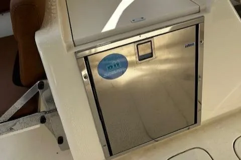 Slide: The Image of Stainless steel compartment on 2015 Scout 275 Dorado boat interior. - 21