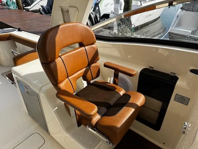 Slide: The Image of Luxurious leather seat on 2015 Scout 275 Dorado boat interior. - 5