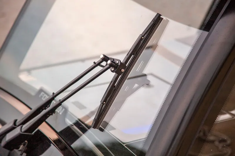 Slide: The Image of Close-up of 2025 Fountain 38 SCX windshield wiper on a sleek glass surface. - 18