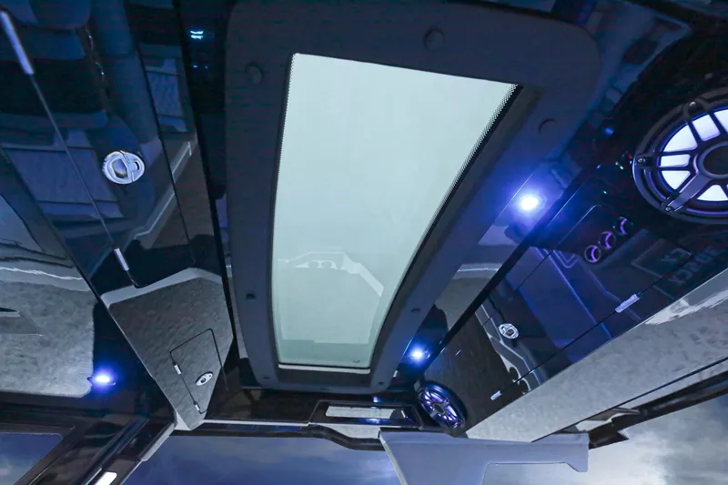 Slide: The Image of 2025 Fountain 38 SCX interior with modern lighting and sleek design. - 22