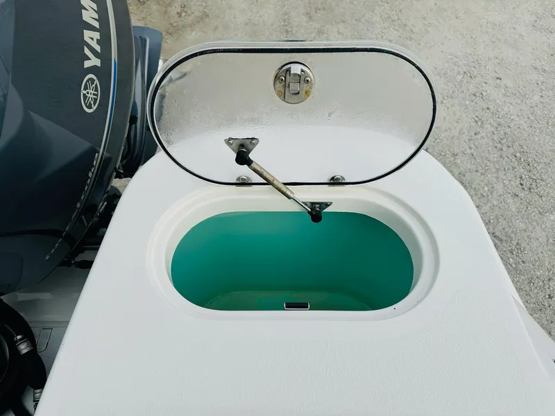 Slide: The Image of Open hatch on 2022 NauticStar 2102 Legacy boat with Yamaha engine. - 20