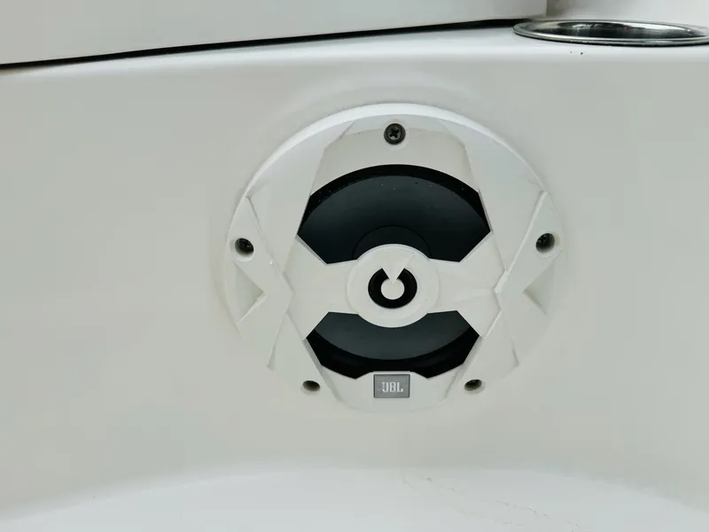 Slide: The Image of JBL speaker on 2022 NauticStar 2102 Legacy boat interior. - 37