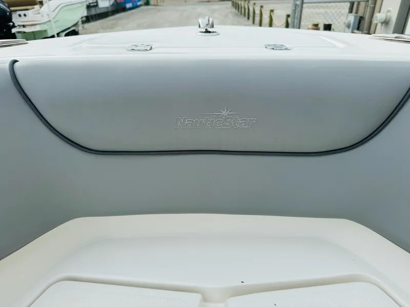 Slide: The Image of 2022 NauticStar 2102 Legacy boat interior with logo detail. - 39