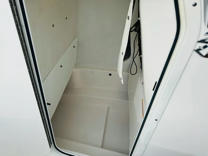 Slide: The Image of Interior storage compartment of 2022 NauticStar 2102 Legacy boat. - 45